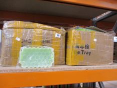 A large quantity of as new green honeycomb silicon ice-cube trays with lid.