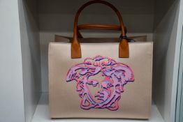 An as new Versace Medusa leather and canvas tote bag (RRP £840).