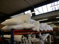 A quantity of as new pillows and cushions (Approximately 40 items).