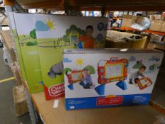 A quantity of children's boxed Chad Valley toys to include: two Mega Jump Race Ramps in blue, two