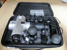 An unbranded massage gun with attachments in protective hard case. (Requires UK adapter)