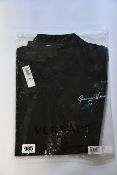 An as new Versace Signature polo shirt in black (XS - RRP £310).