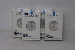 Four boxed as new La Roche-Posay My Skin Track UV wearable sensors.