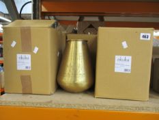 Four as new Nkuku Nami tapered brass pots.