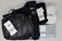 Five items of as new Zara clothing and accessories; a Manteco wool coat (XL - RRP €100), two