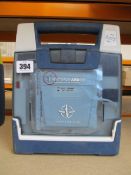 A Cardiac Science G3 AED trainer.