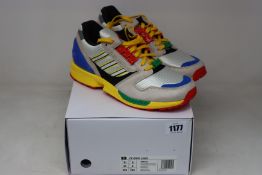 A pair of as new Adidas ZX 8000 Lego trainers (UK 8).