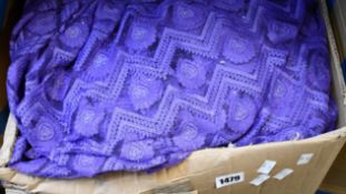 A quantity of assorted African/Asian clothing in various colours.