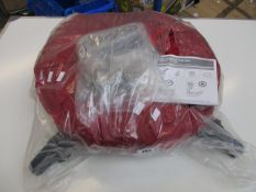 A Balsam Hill Pro Upright Christmas Tree Bag with rolling stand.