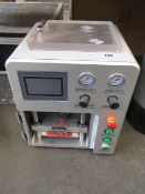 A pre-owned LCD Laminating Machine (Damaged).