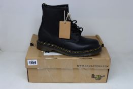 A pair of as new Dr Martens 1460 8 Eye boots (UK 6).
