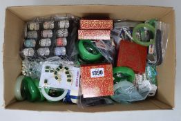 A quantity of assorted costume jewellery to include glass bead necklaces, bracelets, earrings and