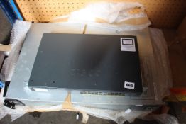 A pre-owned Cisco Catalyst 2960X WS-C2960X-24TS-L 24-Port Gigabit Switch and a pre-owned APC