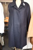 A pre-owned Prada coat in navy (Size 40 - Very good condition).