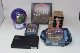 A collection of cosmetic items to include twelve Body Shop festive berry hand cream tubes (30ml),