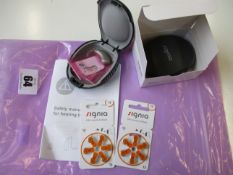 Two as new Signia Motion 13 hearing aids (PN: 5NX DKC) (One boxed, one with protective case only)