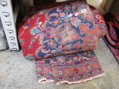 A pre-owned handmade Persian carpet (380x286cm).