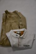 Two items of pre-owned Burberry clothing; a youth's polo shirt (14 years) and a dress (UK 8 - both