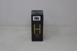 A boxed as new Hourglass Equilibrium Broad Spectrum SPF 30 Day Fluid (49.3ml).