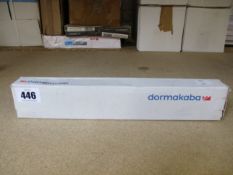 A boxed Dormakaba concealed fire door closer (PN: ITS 96).