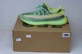 A pair of as new Adidas Yeezy Boost 350 V2 trainers (UK 7).