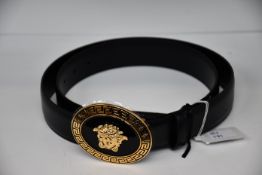 An as new Versace oval medallion leather belt (Size 105 - RRP £350).
