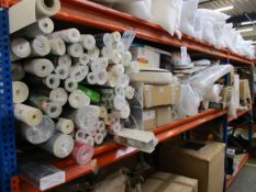 A large shelf of assorted household items to include blackout blind, wash basin, cot mattress,