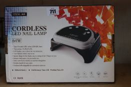 A boxed as new 64W cordless rechargeable LED nail lamp light gel polish nail dryer timer beauty.