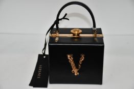 An as new Versace Virtus square handbag (RRP £1,770).