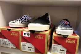 Three pairs of as new Vans Classic slip-on sneakers (UK 3, 5, 10).