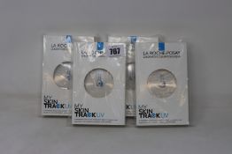 Four boxed as new La Roche-Posay My Skin Track UV wearable sensors.