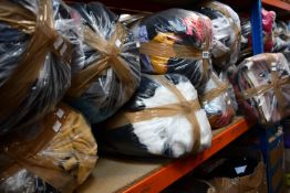 Nine bags of assorted clothing and related items.