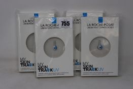 Four boxed as new La Roche-Posay My Skin Track UV wearable sensors.