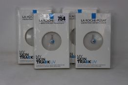 Four boxed as new La Roche-Posay My Skin Track UV wearable sensors.