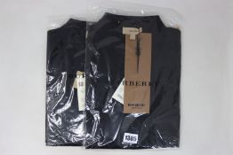 Two as new Burberry black polo shirts (M).