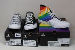 Three pairs of as new Converse footwear; CTAS Pride Hi (UK 7), CTAS Dainty (UK 5, some marks on