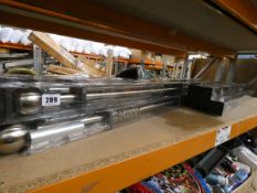 Eleven PowerHome curtain rails in various lengths and colours.