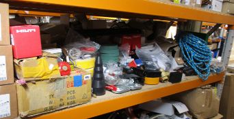 A shelf of assorted items to include miscellaneous, tools, rope and industrial items.