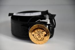 An as new Versace Medusa belt with crystals (Size 110 - RRP £400).