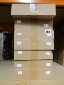 Fourteen individually boxed drill guide sets for cup style concealed hinges.