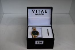 A boxed as new Vitae Elmington 36mm wrist watch (emerald green face). box includes additional