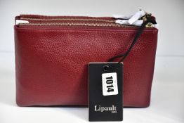 An as new Lipault Invitation multi pouch bag in burgundy.