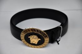 An as new Versace oval medallion leather belt (Size 100 - RRP £350).