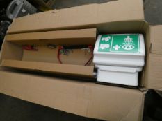 A boxed as new commercial emergency eyewash station.