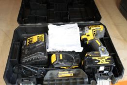 A pre-owned DeWalt DCD796 18V XR Cordless Brushless Combi Drill complete with 2x 18V 4.0AH battery