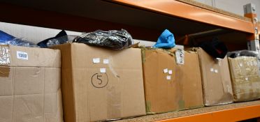 A quantity of assorted as new clothing and related items.