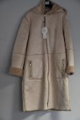 An as new Oui reversible sheep skin style coat (Size 38 - RRP £309).