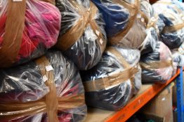 Nine bags of assorted clothing and related items.