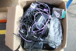 A box of assorted cables and chargers (All items sold as seen).