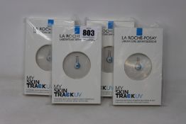 Four boxed as new La Roche-Posay My Skin Track UV wearable sensors.